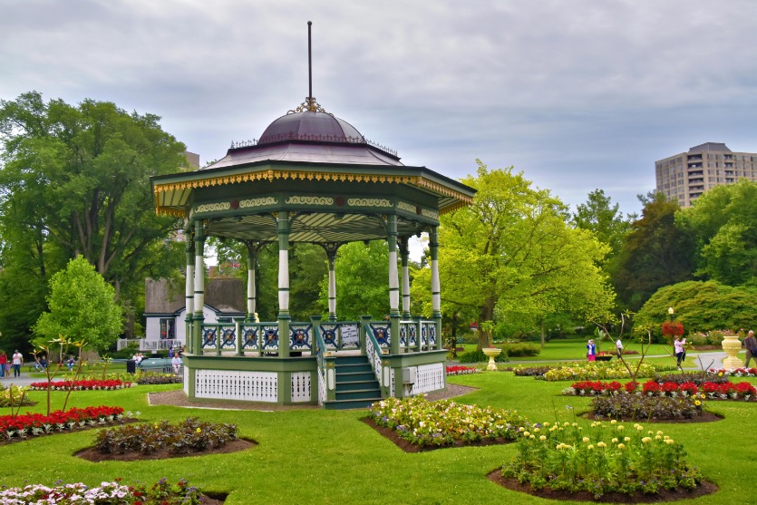 Ornate bandstand surrounded by flower beds in the Halifax Public Gardens.