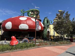 Mushroom-shaped building and colourful play area at Give Kids The World Village in Kissimmee.