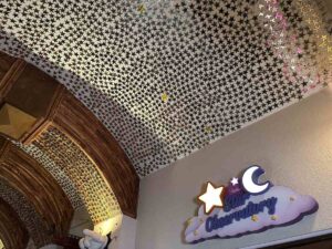 Ceiling of gold stars inside the Castle of Miracles at Give Kids The World Village.