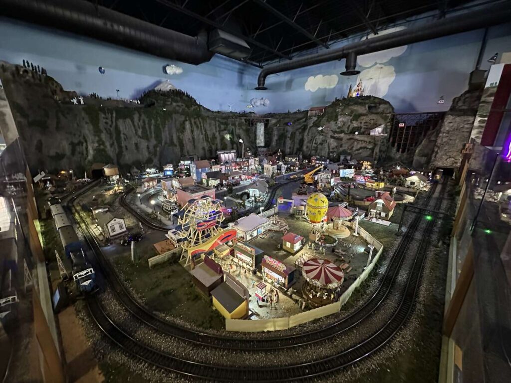 Model train display inside Amberville at Give Kids The World Village in Kissimmee.