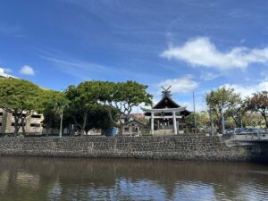 Shrine-like building beside a canal in Honolulu’s Chinatown area.