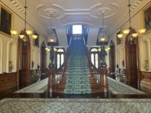 Grand staircase inside ʻIolani Palace.