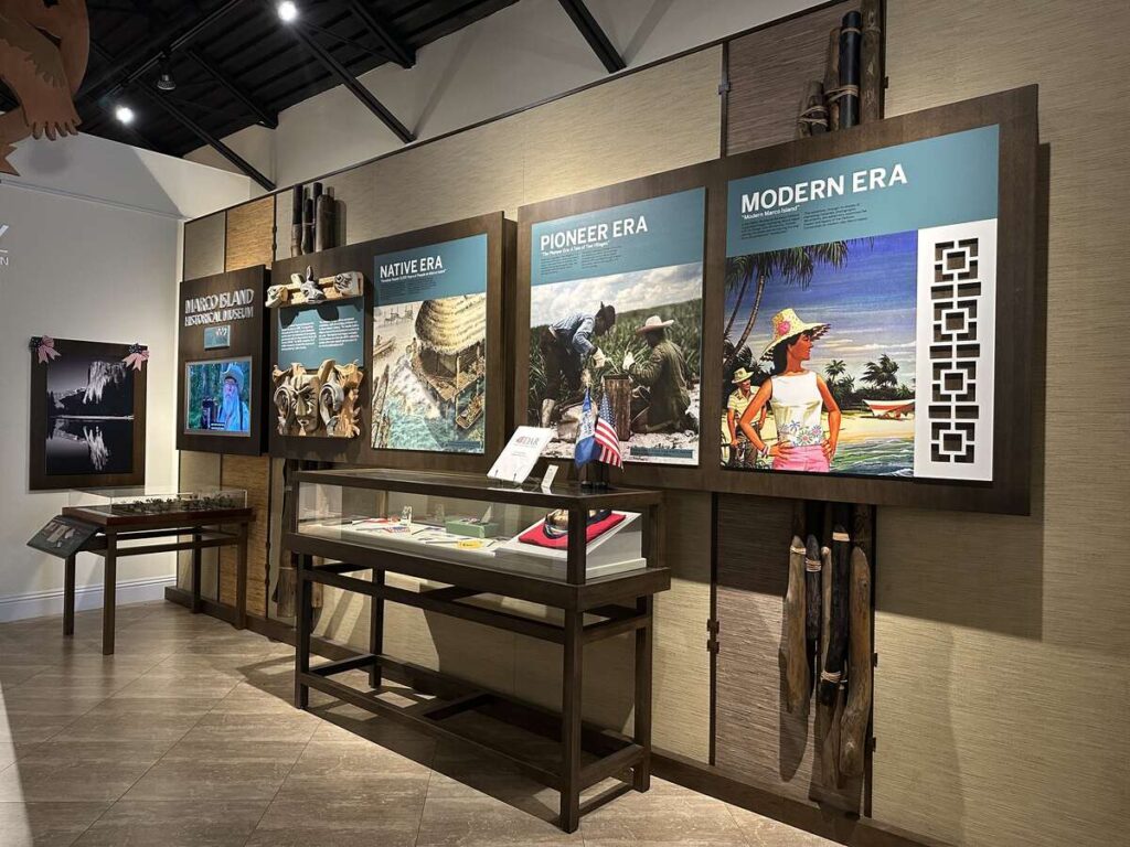 Marco Island Historical Museum exhibit panels showing Native Era, Pioneer Era, and Modern Era history.