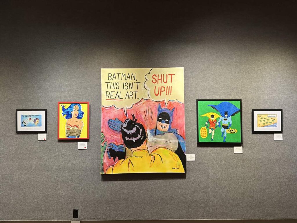 Pop-art gallery wall featuring Batman, Robin, Wonder Woman, and comic-style humour.