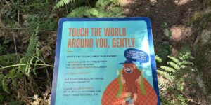 Malahat SkyWalk sign encouraging visitors to explore nature gently and leave no trace.