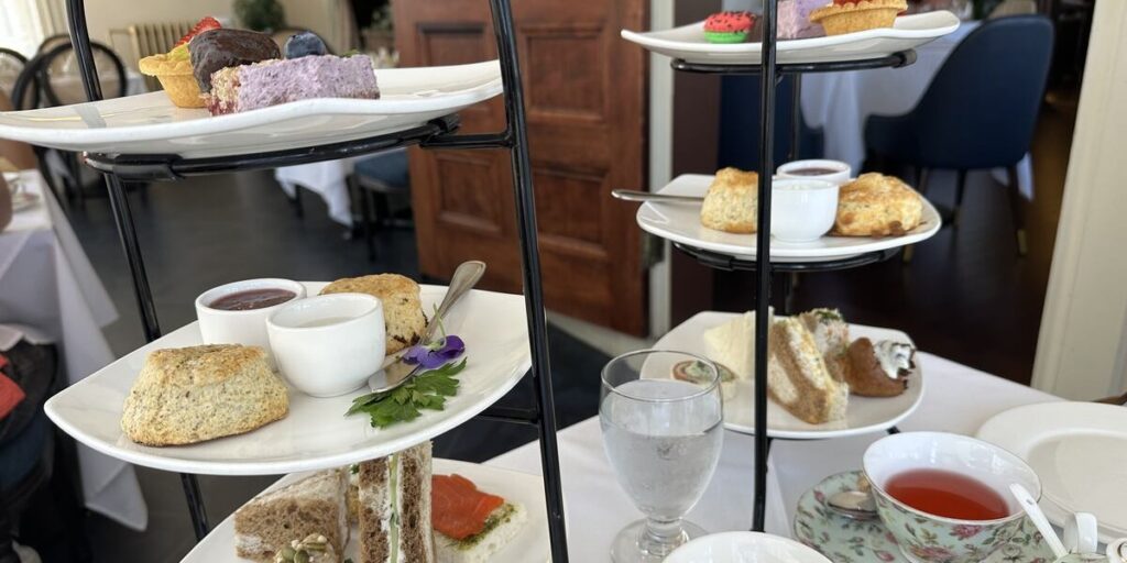 Tiered afternoon tea with sandwiches, scones and pastries at Pendray Tea House in Victoria.